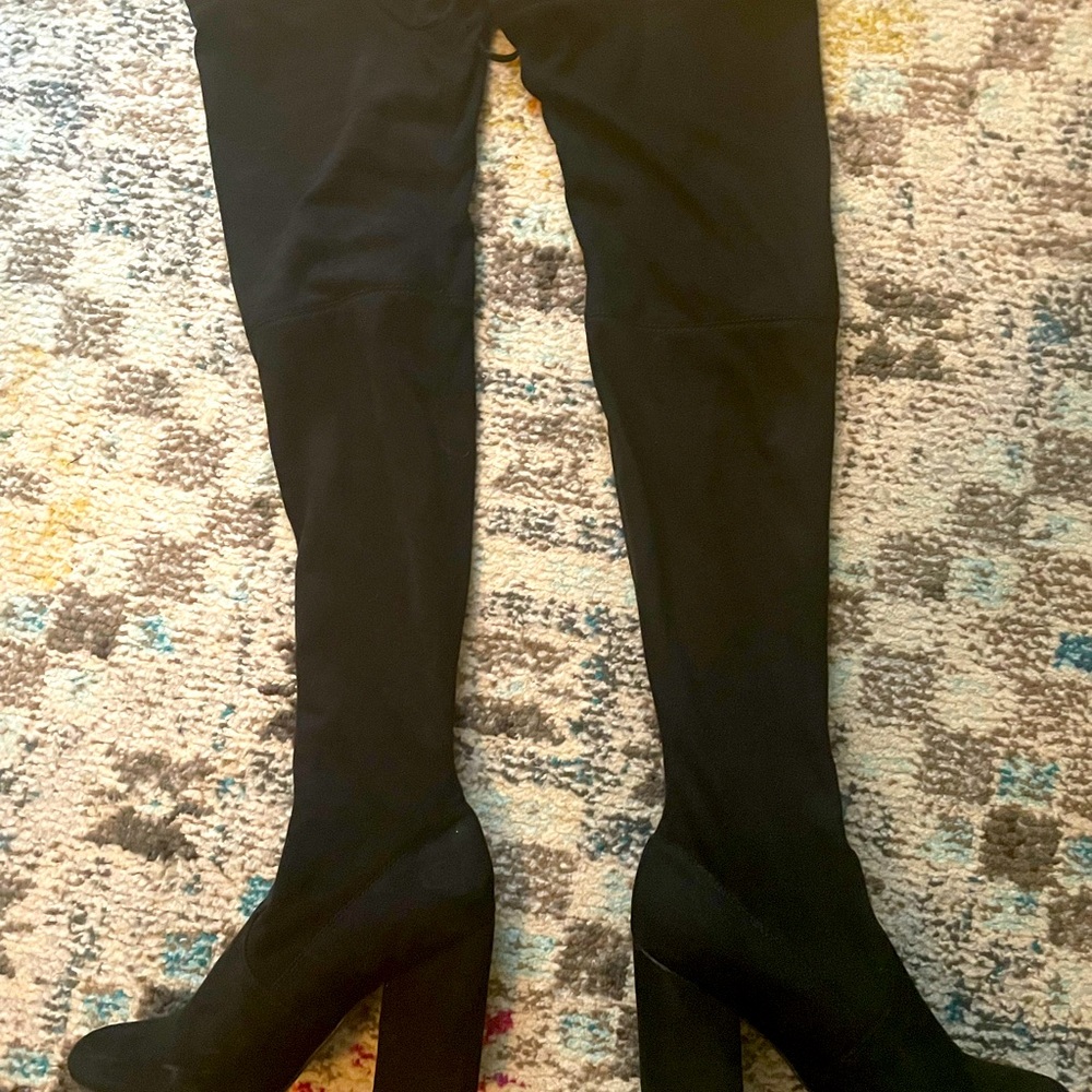 Steven Madden thigh high black boots.